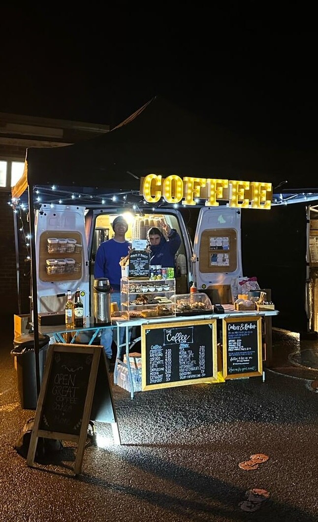 Serving hot drinks well into the night from the back of her Ford